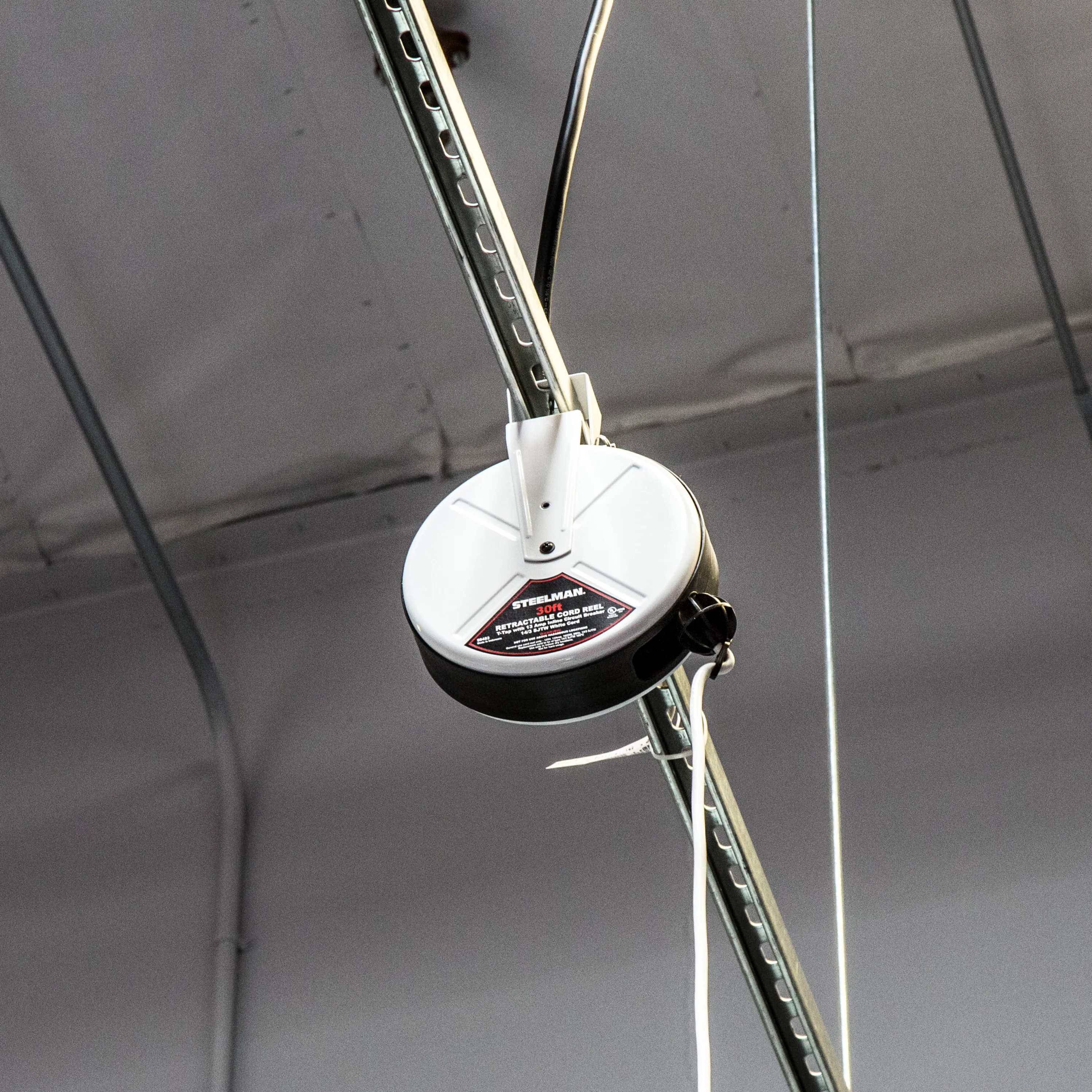 30-Foot Retractable Cord Reel with Triple Tap and 13A Inline Circuit Breaker - Image 7